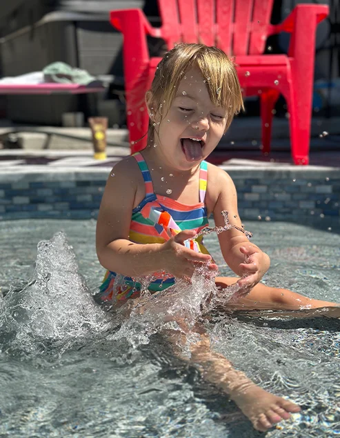 Little Girl Enjoying Pool Hp Heaters